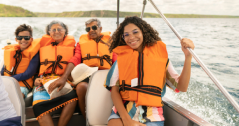 group of people enjoying a ride on a boat